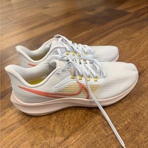 Nike Women's pale blueish white and Peach Athletic Shoes